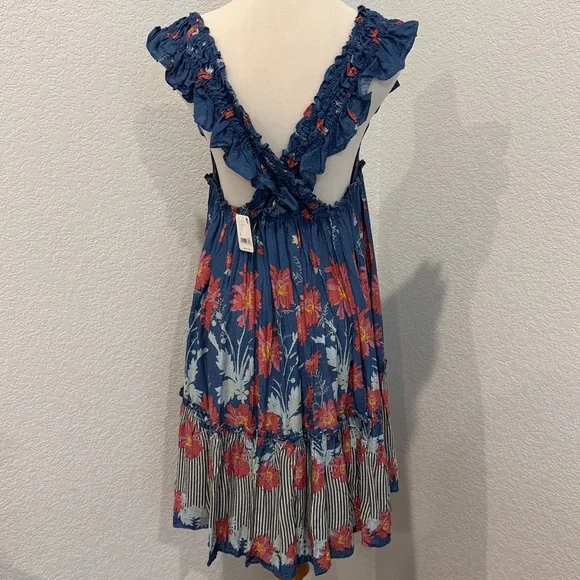 FREE PEOPLE Bali Wild Daisy Slip /
Stellar Combo size Medium - Picture 6 of 14